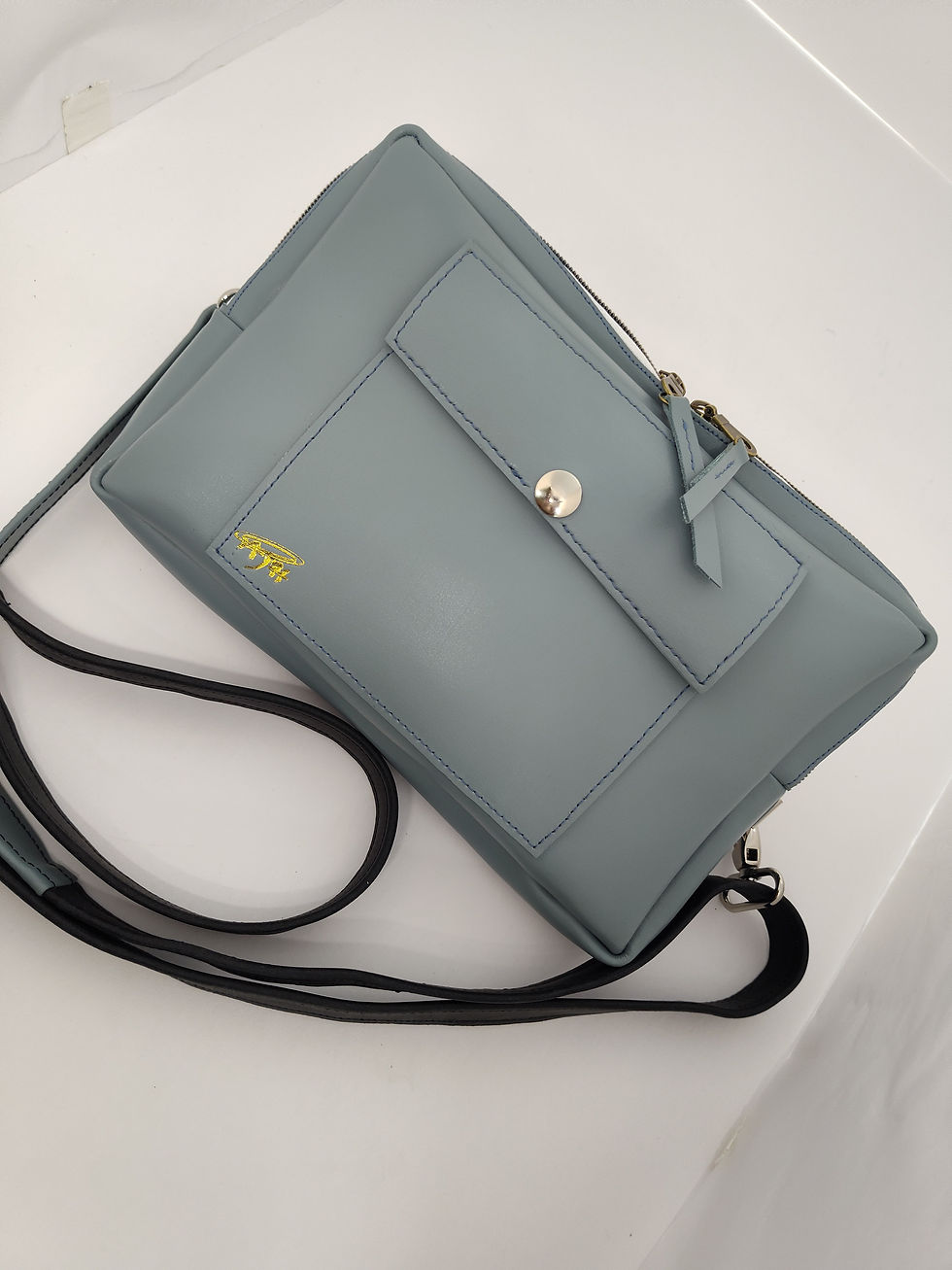 Thumbnail: The Clutch Sling and Belt Bag