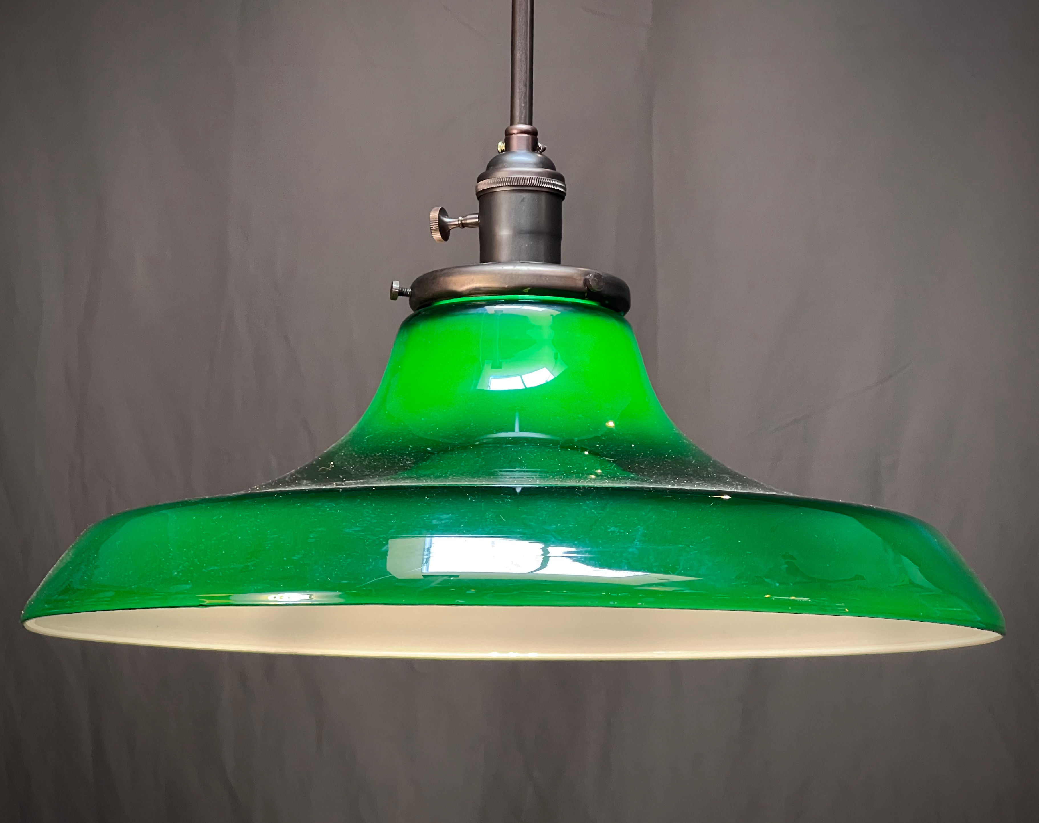 16” wide green glass over white pendant light