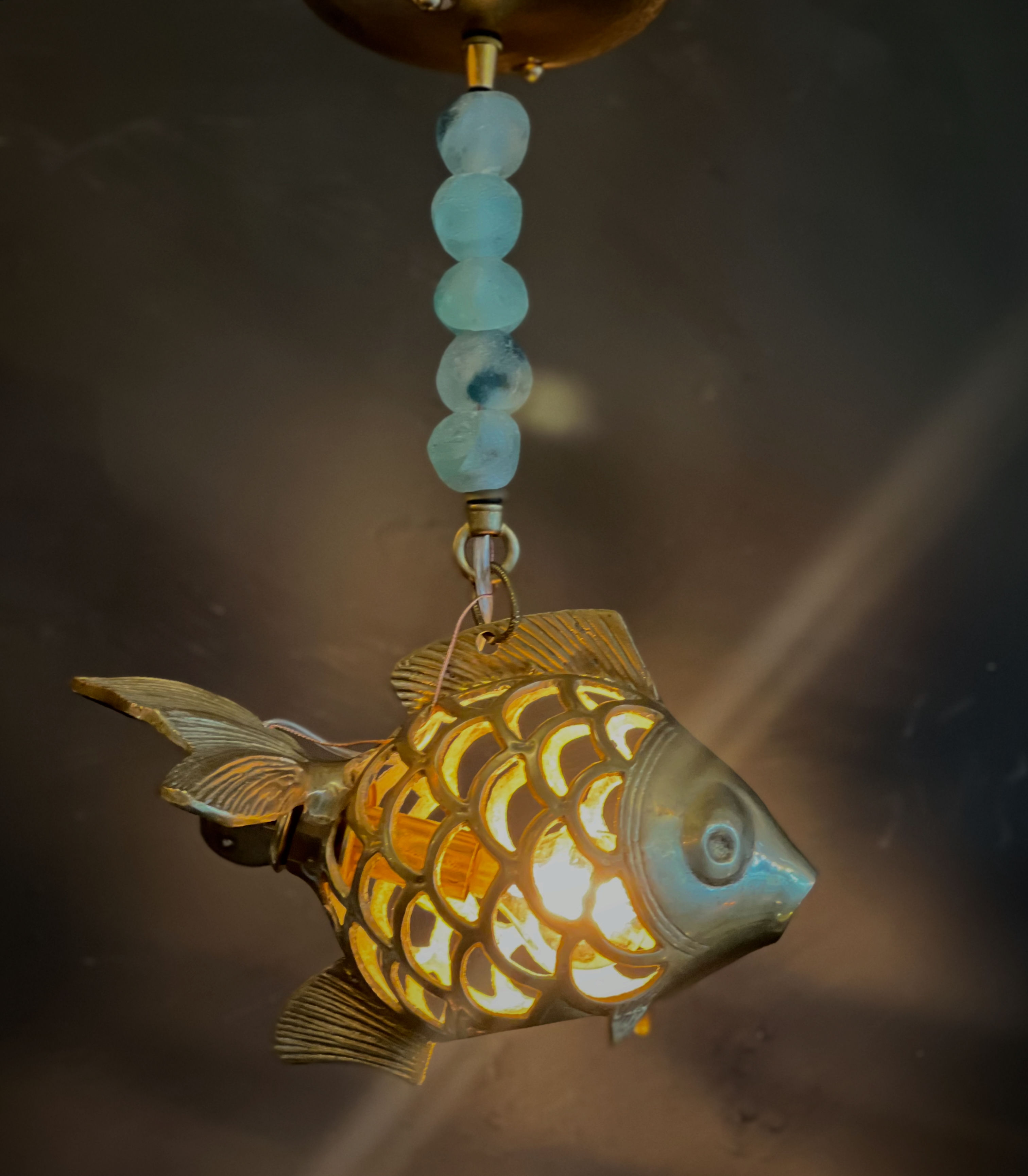 Goldfish with blue glass beads 