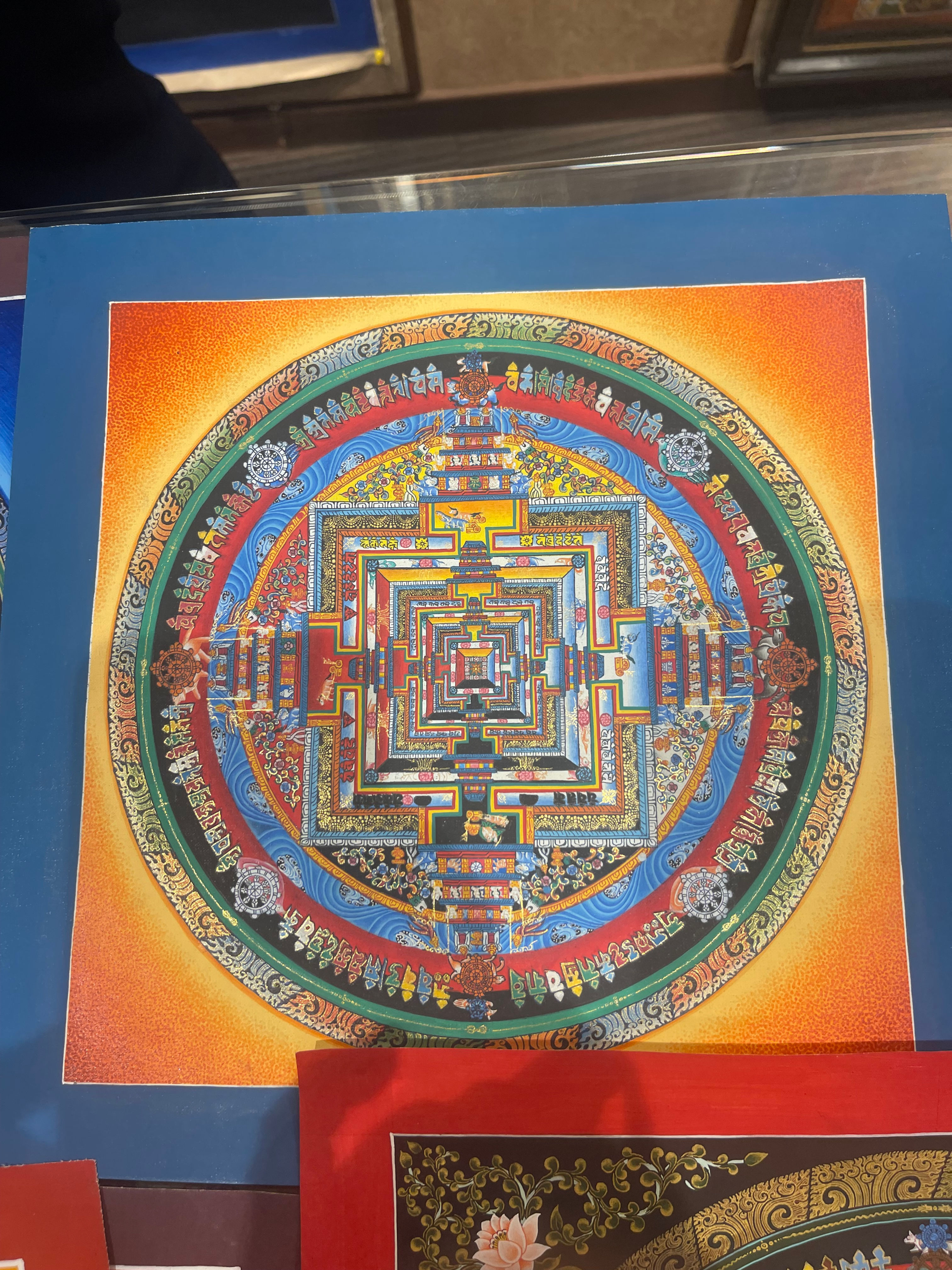 Nepalese sacred Mandala painted by intermittent student monk