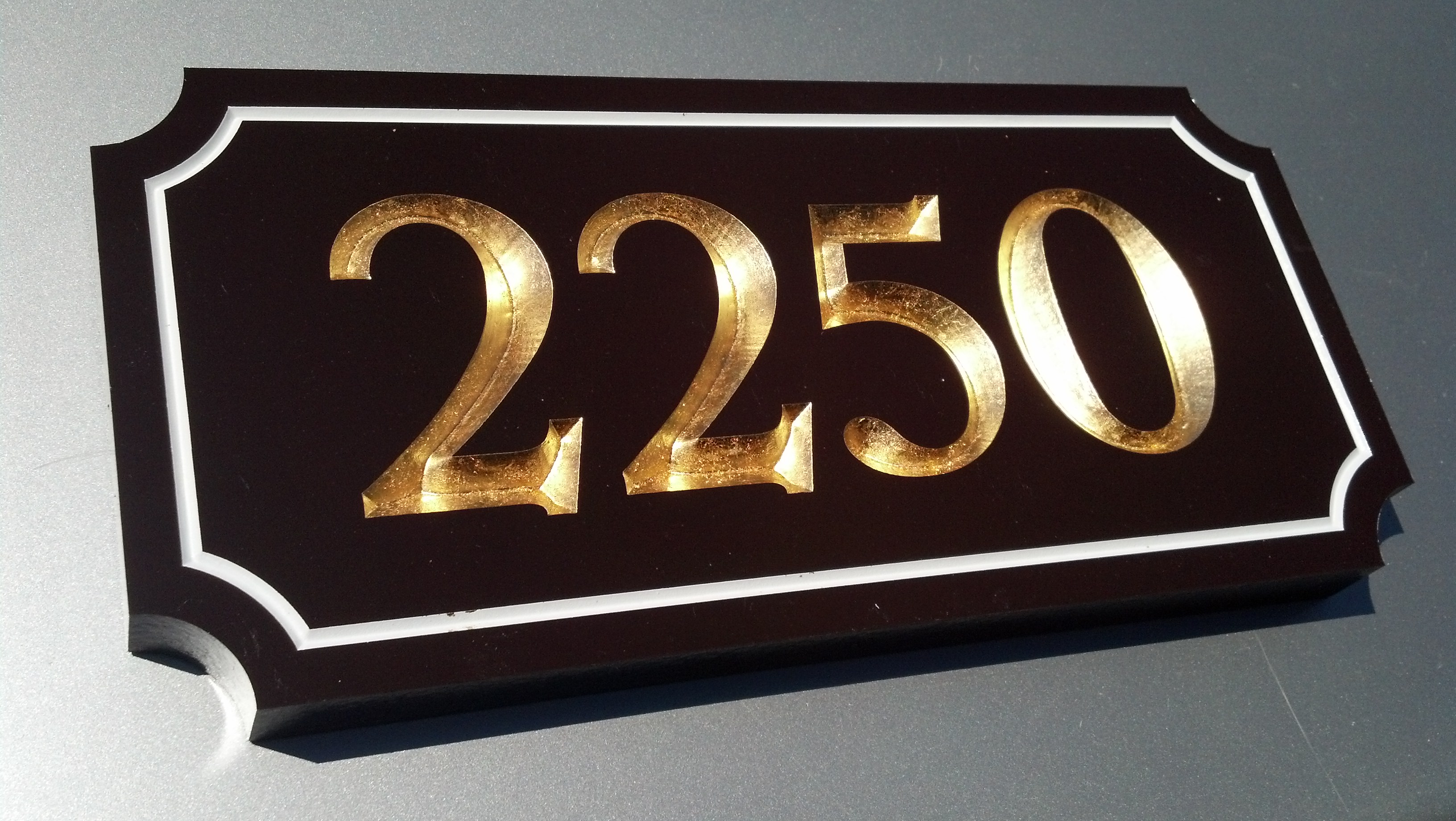 gilded address plaque