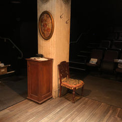 The image shows a theatrical set