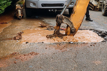splatter of red mud from a water main break