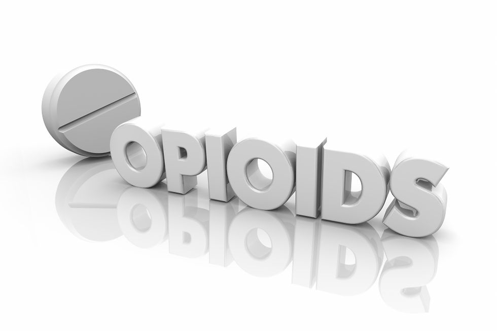 3D white OPIOIDS text beside a pill icon on a glossy white background, with mirrored reflection