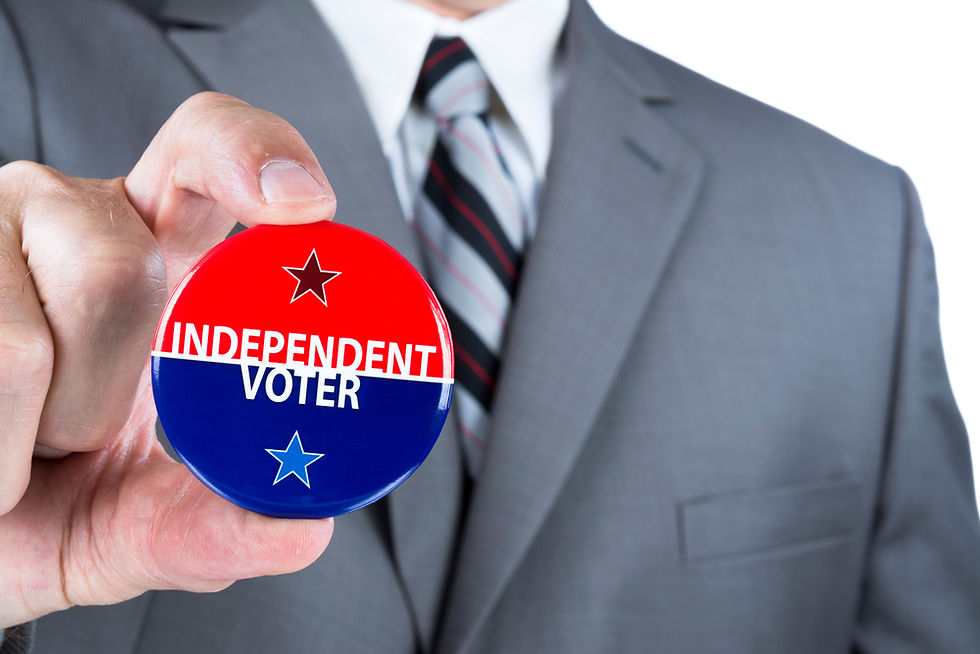 Man holding Independent Voter badge