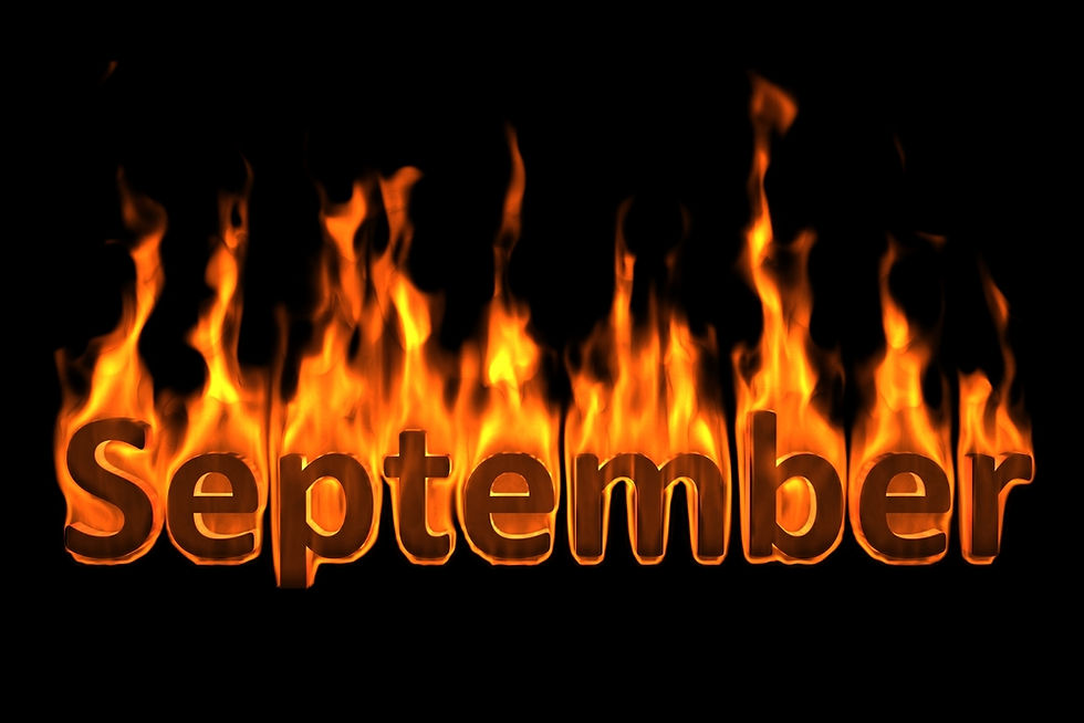 Flaming September text with orange flames on a black background.