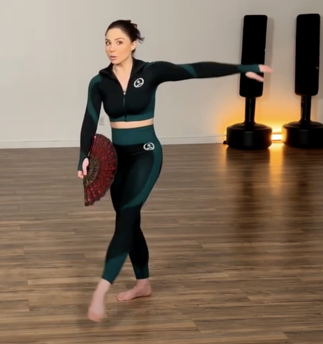 Personal trainer and functional aging specialist, Emma Mattison, guiding a client in dance choreography for fitness and well-being. Discover the joy and health benefits of dance. Book a free phone consult with Emma to enhance your fitness journey.