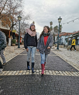 two women walking on the street of Zicron Yaakov