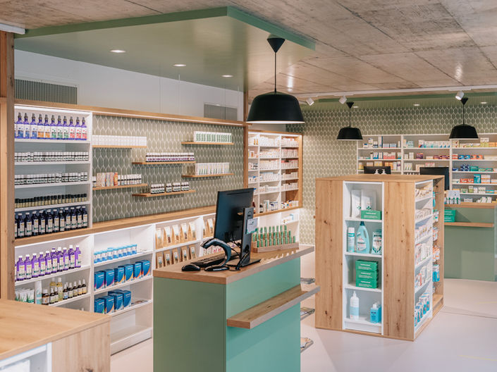 agencement pharmacie l'officine Delémont Romont Fribourg architecture intérieur