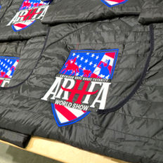 Custom embroidered Port Authority J851 puffer vests for ARHFA World Show in Amarillo Texas