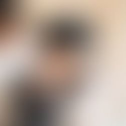 woman wearing a baby in a baby carrier