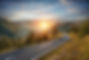 Motorcycle driver riding in Alpine highway, Nockalmstrasse, Austria, Europe. Outdoor phot