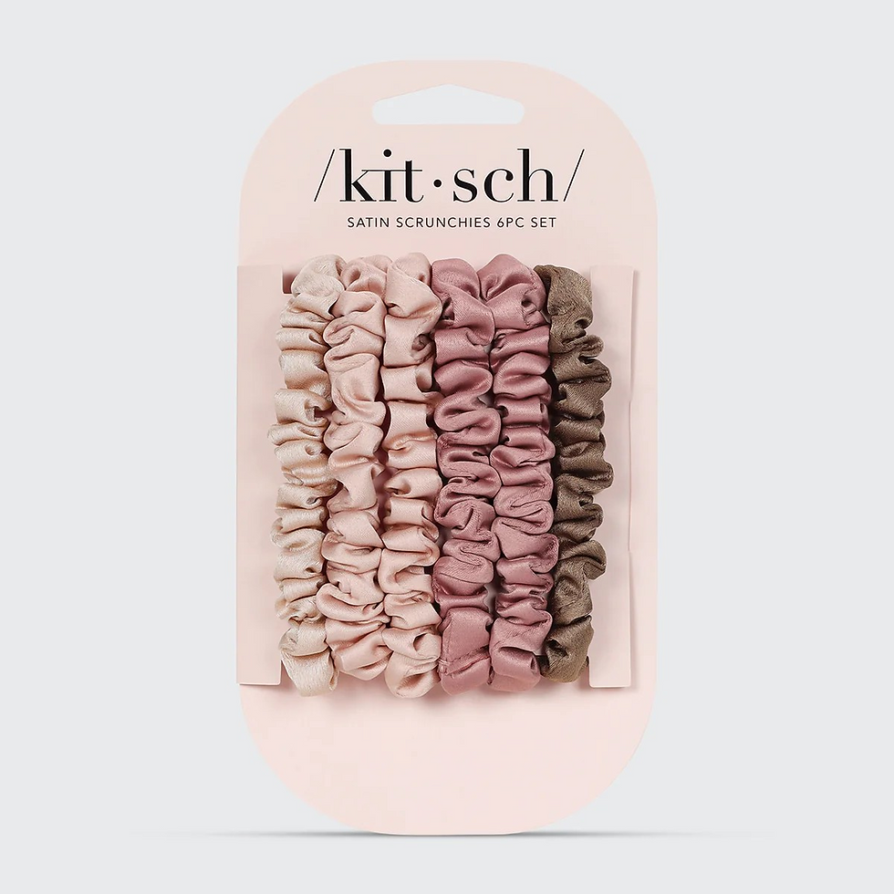 Flat lay of Kitsch satin scrunchies 6-piece set in packaging, featuring a gradient of blush, rose, and terracotta tones.