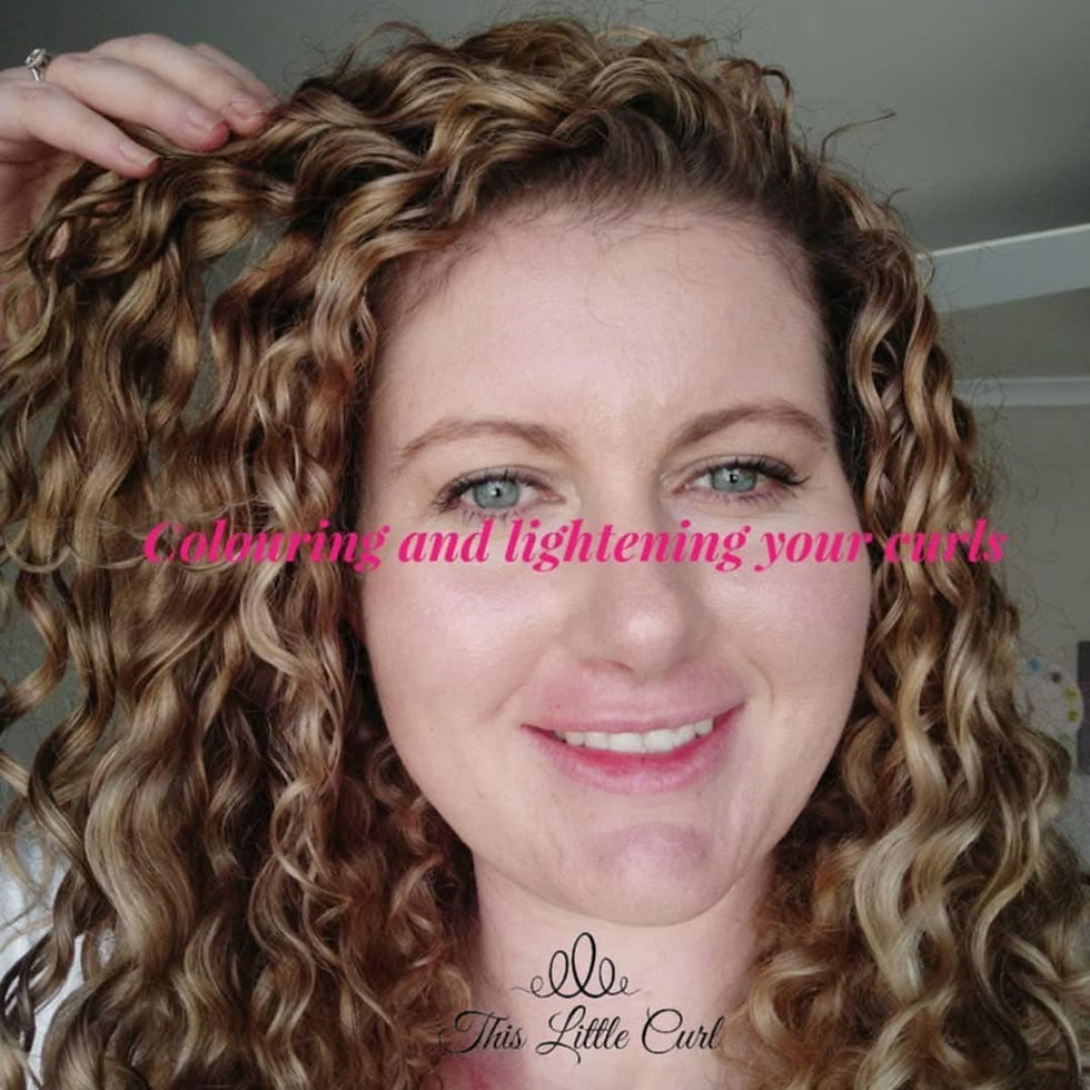 A women showing her bleac lightened curls that are still healthy, shiny and defined