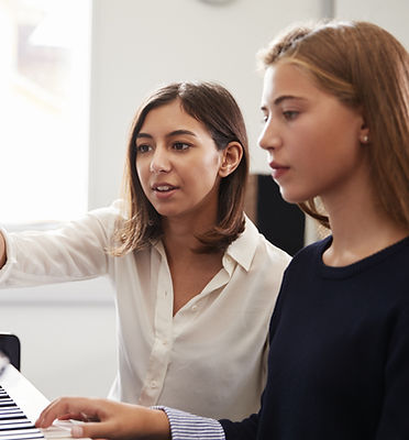 Teacher and Pupil at Piano Lesson in Edinbugh