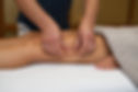 Woman getting legs lymphatic drainage massage in spa salon. Closeup. Body relaxation beaut