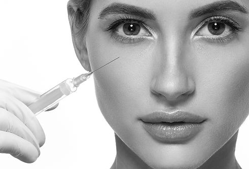 People, Lips, cosmetology, plastic surgery and beauty concept - beautiful young woman face