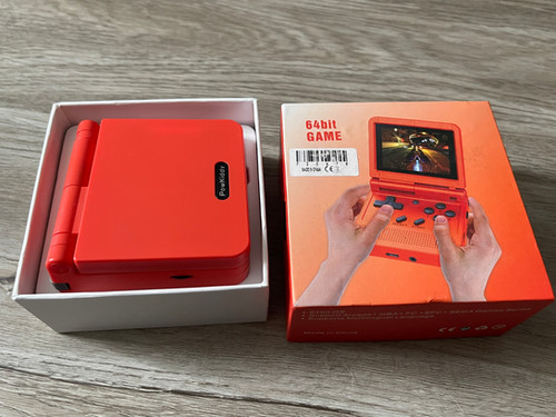 Powkiddy V90 (handheld (orange color) w/ 128 GB SD Card