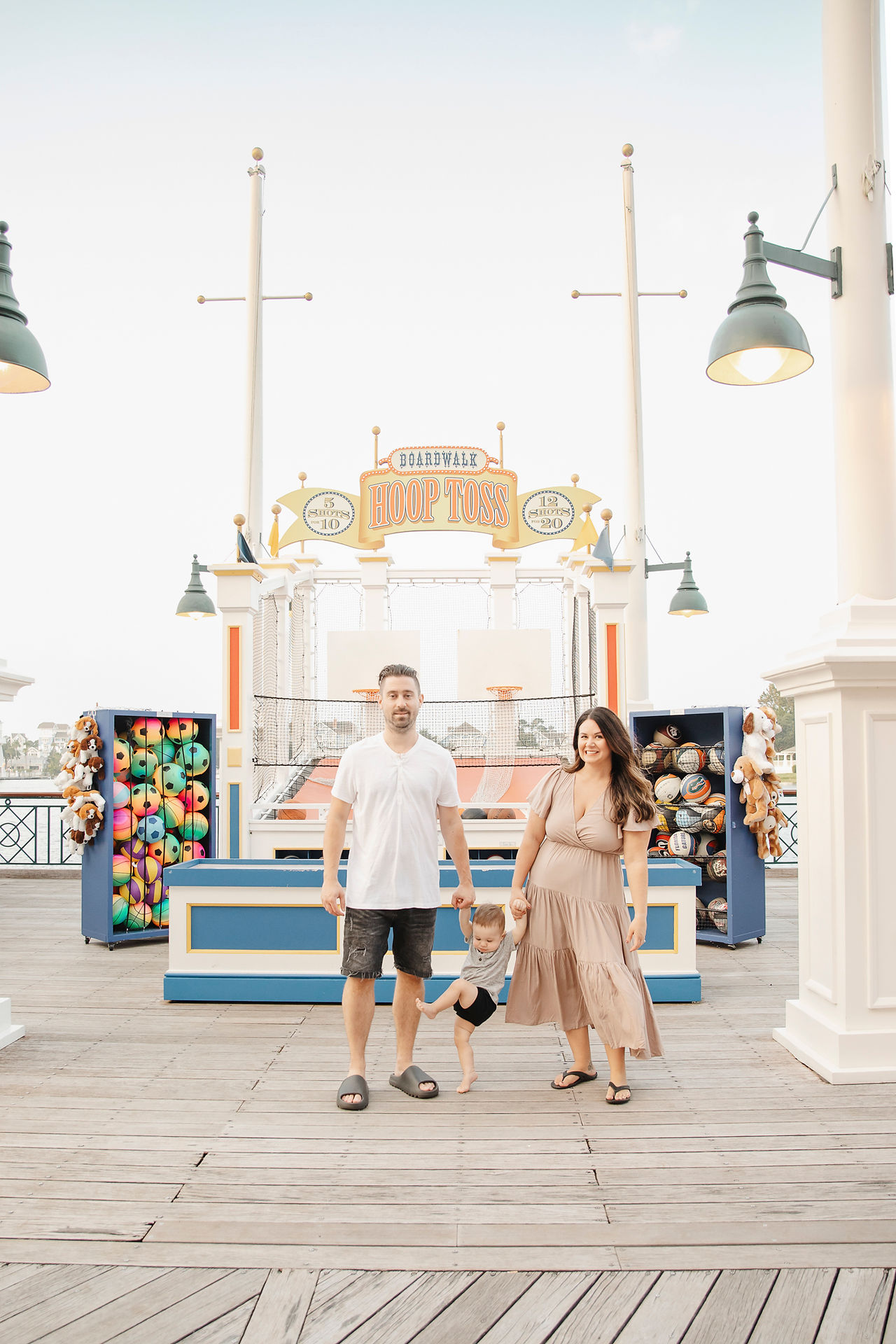 Disney's Boardwalk Resort Family Photo Session with midway games