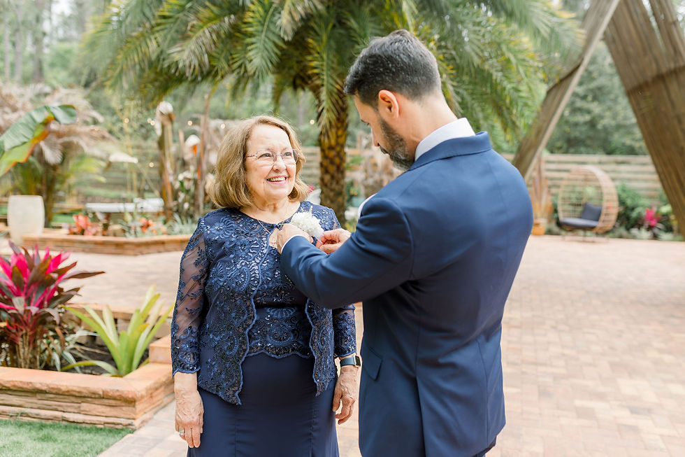 the-pinery-wedding-howey-in-the-hills-florida groom helping mom
