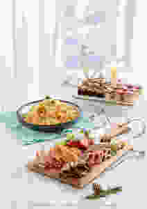 At $32/pax, it comes with a delectable Brie & French Camembert Cheese Platter with Assorted Cold Cuts. Please your guests with the fragrant Roasted Butternut Pumpkin & Pepper Pilaf Rice with Saffron, and a delightful mix of new dessert items- Almond Raspberry Linzer Tart Cake and Toblerone Chocolate Cake.