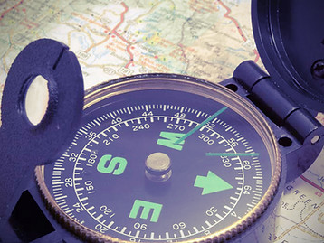 Compass on map