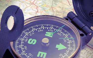 Compass on map