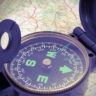 Compass on map