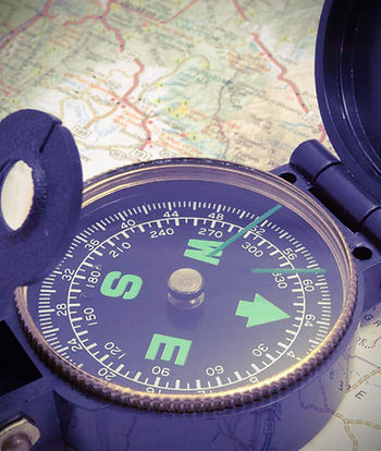 Compass on map