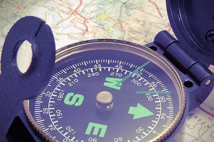 Compass on map
