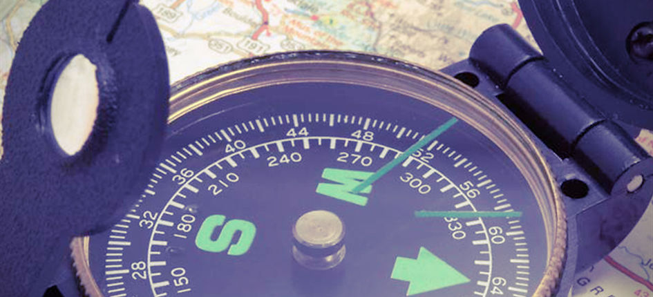 Compass on map