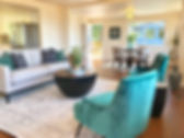 staged living dining kitchen rooms with green teal accents