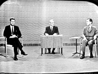 Televised 1960 debate featuring John F. Kennedy and Richard Nixon, illustrating early examples of body language under scrutiny
