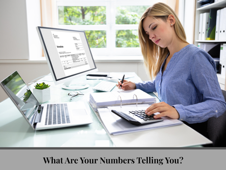 A small business owner examining her income statements.
