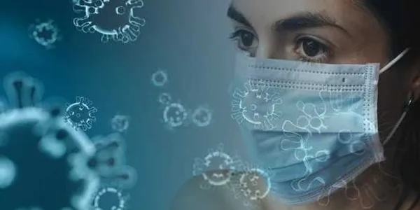 person wearing mask due to poor indoor air quality