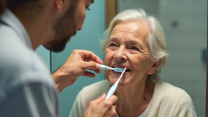 A calm carer assisting a dementia patient to clean their teeth