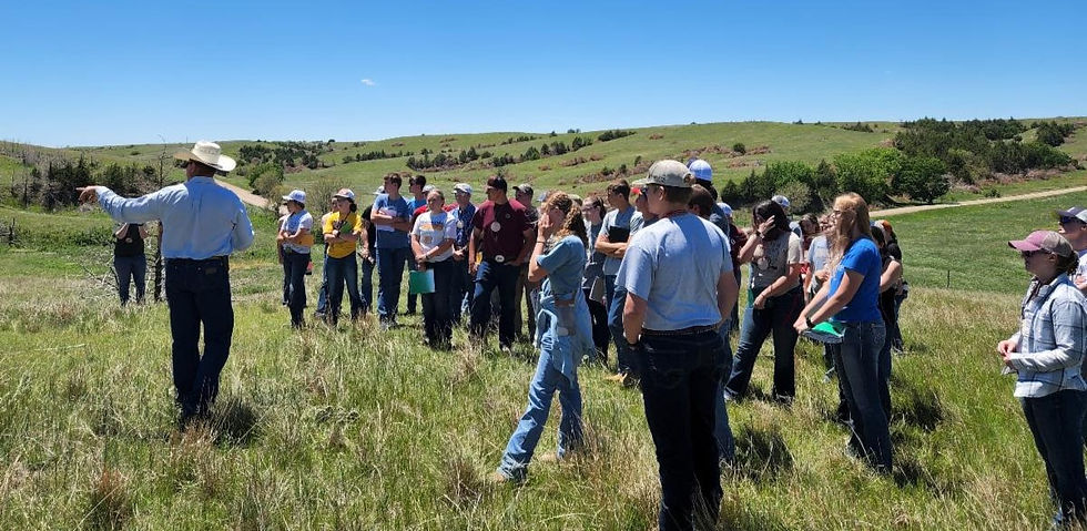 cowboy explaining rangelands to youth