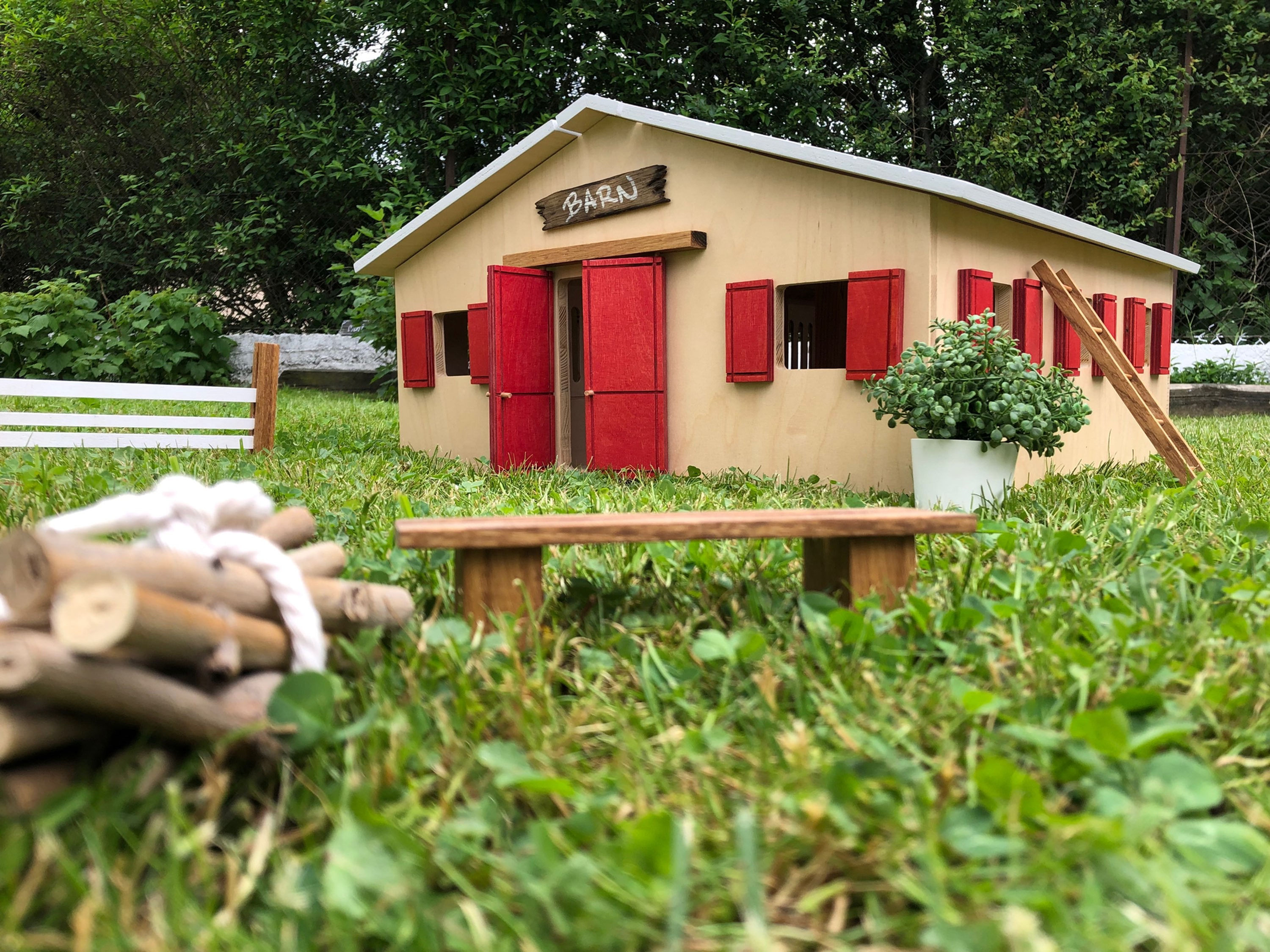 A lovely mini horse stable, a wooden stable with shutters and obstacles