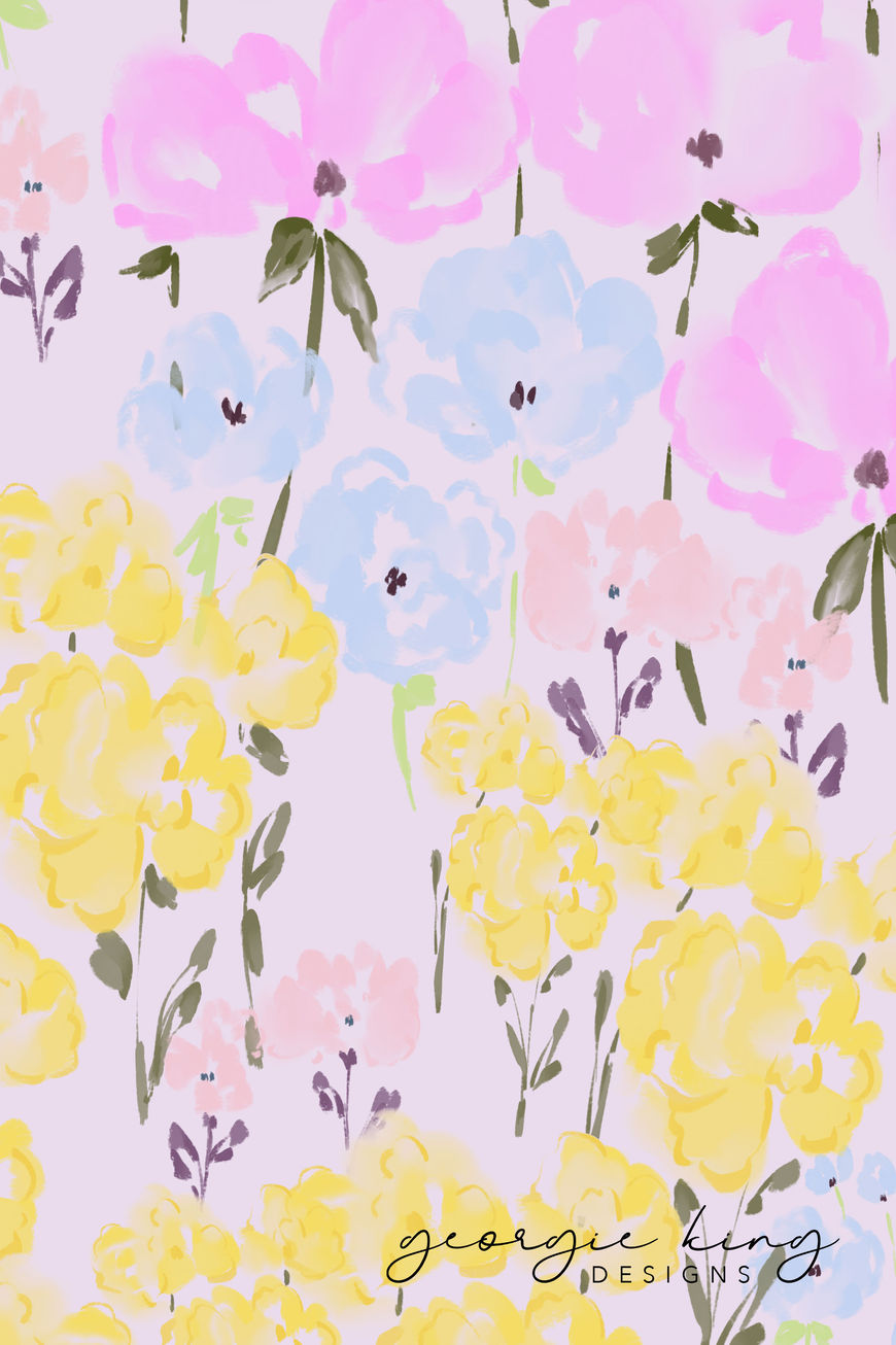 pastel pink. yellow and blue ditsy floral pattern close up