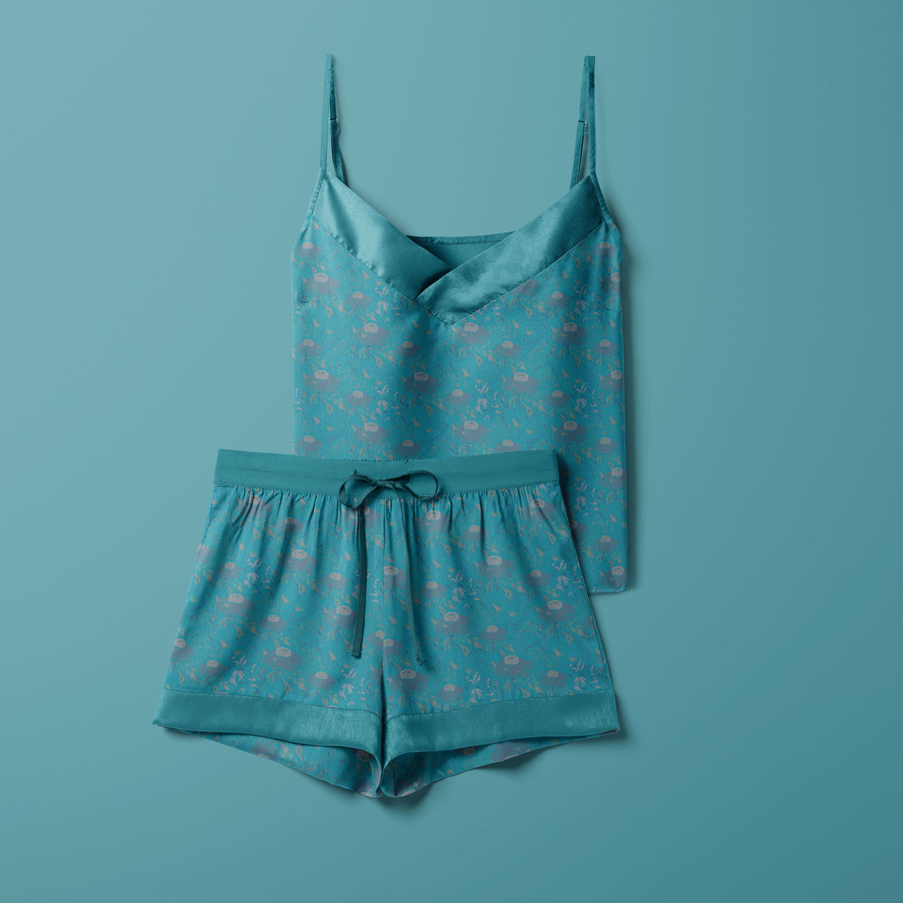 Muted blue wildflowers pattern on a silk pyjamas set