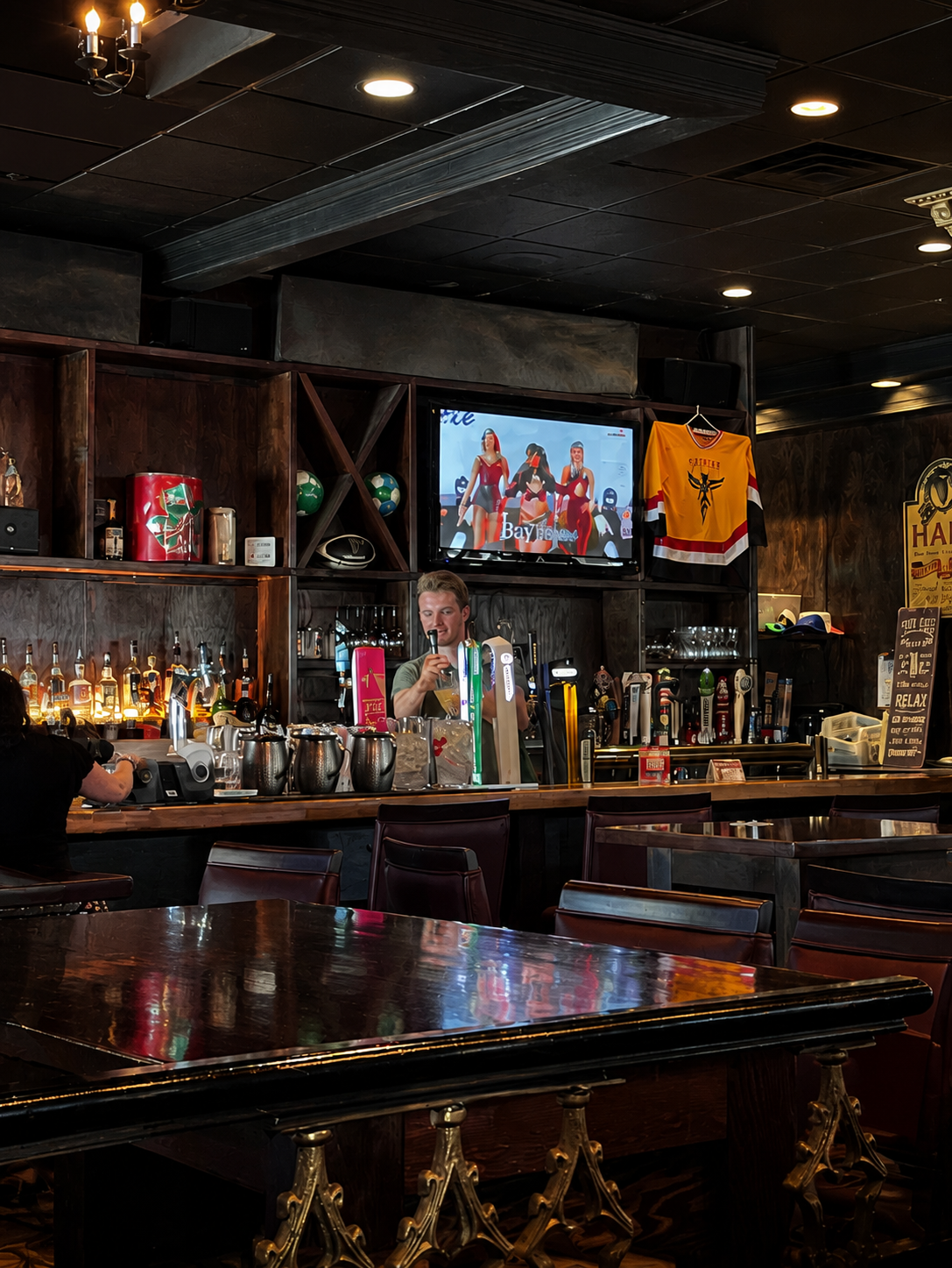 Inside Golden Parrots Pub, a place to gather