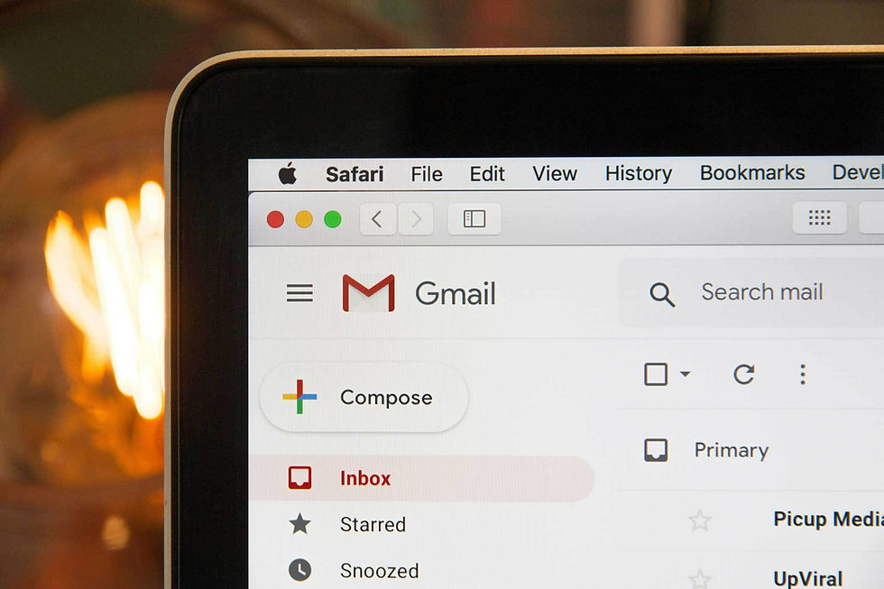 Close-up of Gmail inbox on a laptop screen, highlighting Promotions tab changes impacting hotel email marketing.