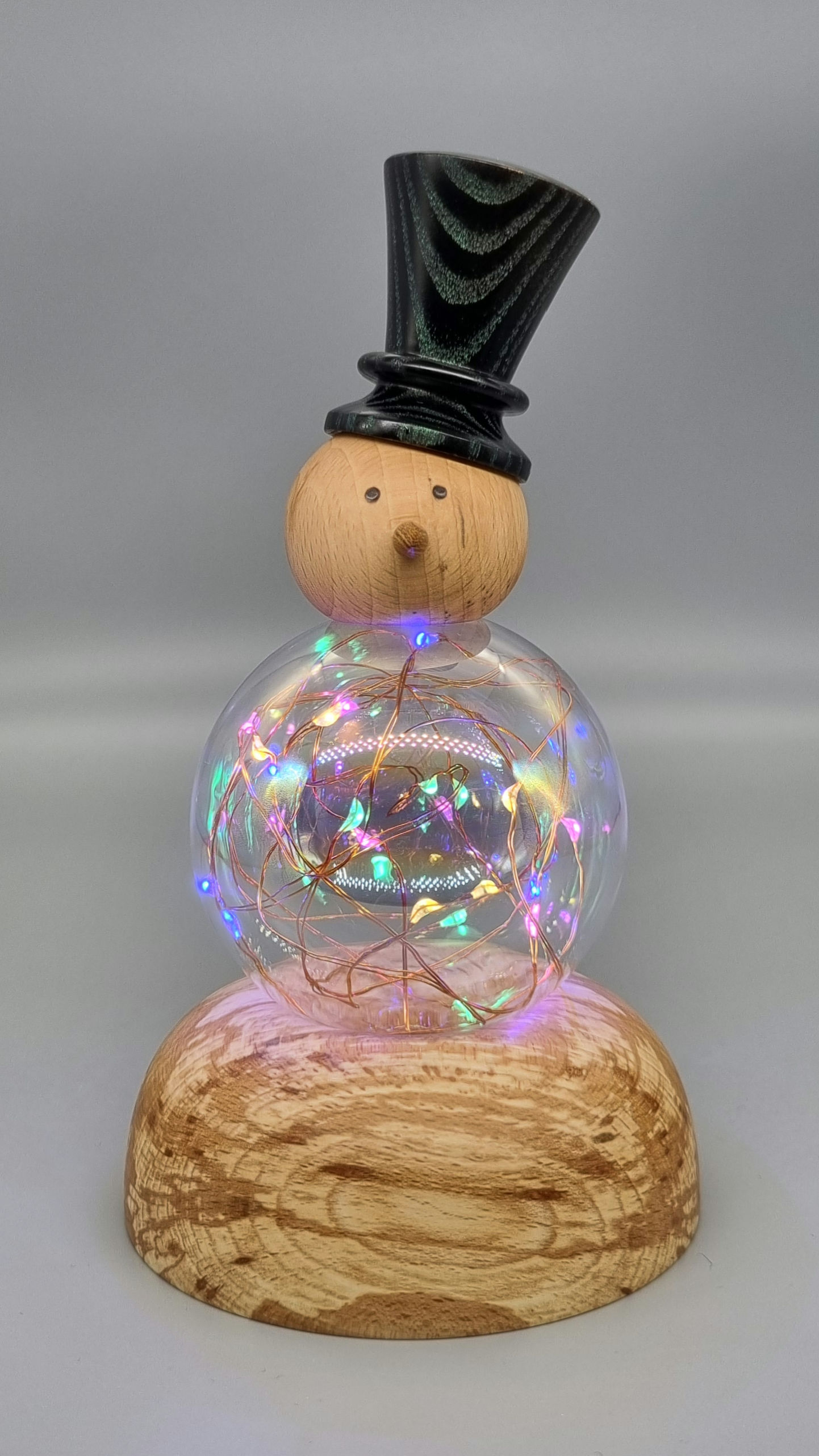 Snowman with led lights and hand blown glass bubble