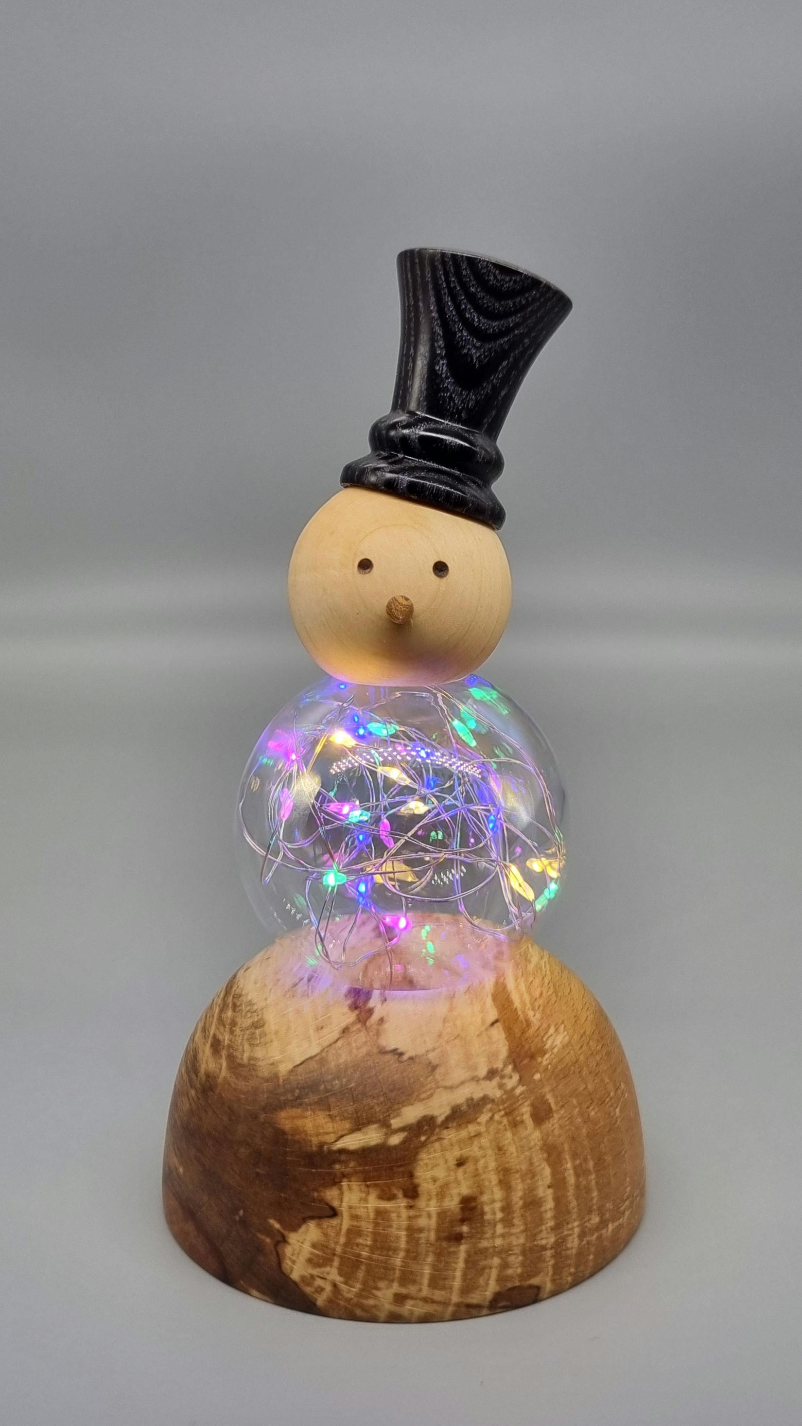 Snowman with led lights and hand blown glass bubble