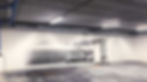 a plastered wall with a large format wall mural used as an example of the large size option for customers. 