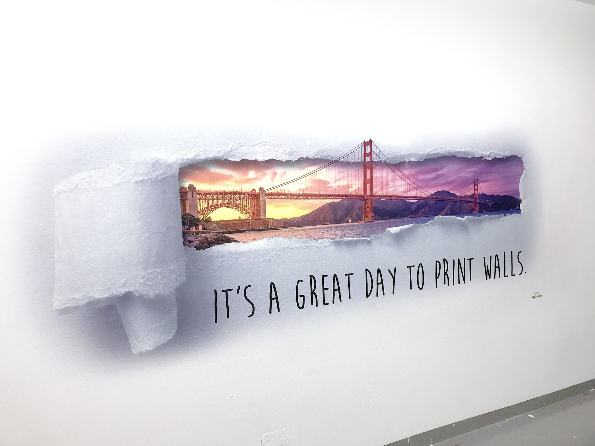 a wall printed mural of "it's a great day to print on walls" to show the clarity and seamlessness of a mural printed on a wall. 