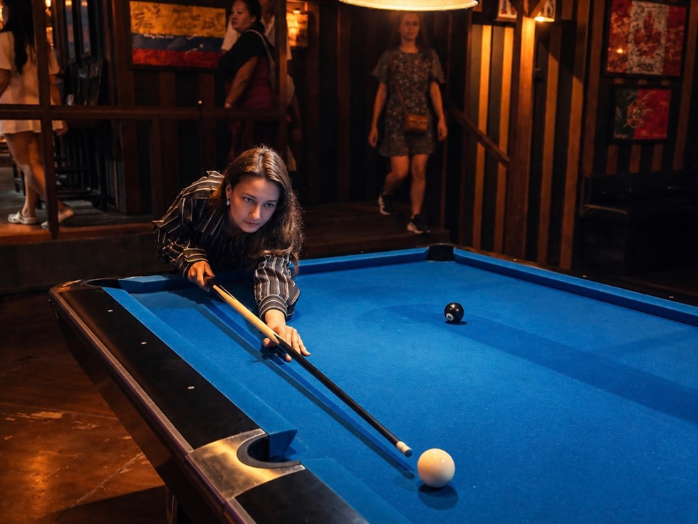 Pool tables and games at The Melting Pot Saloon in Ubud