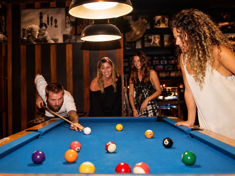 Friends playing pool in Ubud Bali