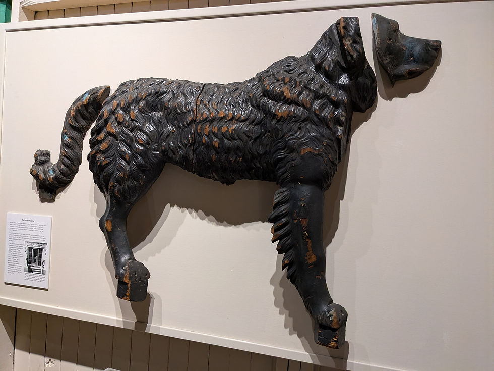 The original wooden mold used to make the iron dog statues in Baltimore on display at the Baltimore Museum of Industry. Photo supplied by The Baltimore Museum of Industry