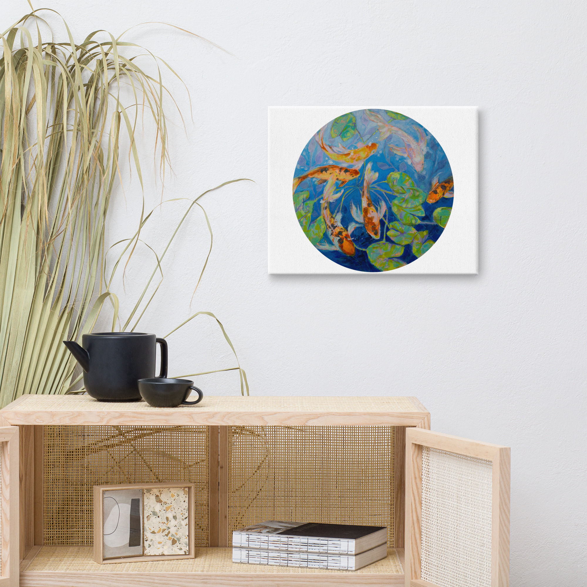 Circular canvas art of koi fish and lily pads